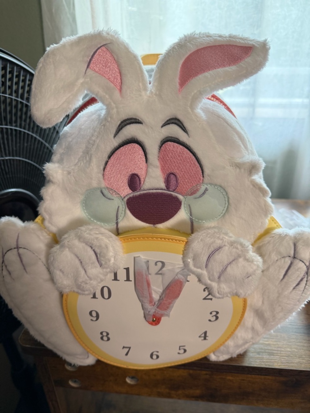 White rabbit and Chesire loungefly backpacks!